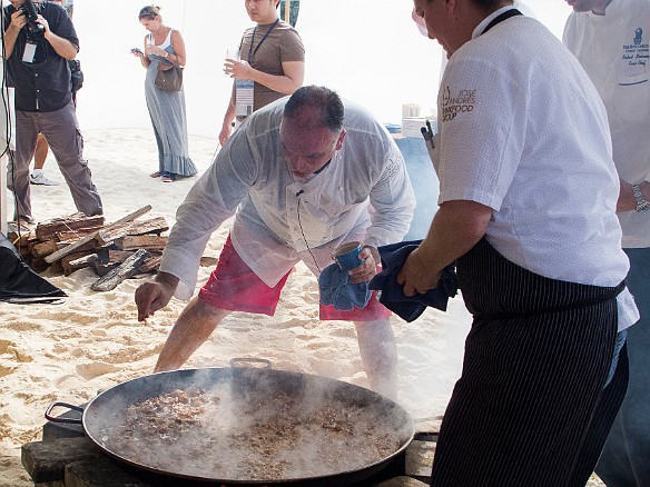 Final stages of the paella. Two giant pans over open fires on the beach Jan 18, 2013 10:48 AM : Grand Cayman, José Andrés