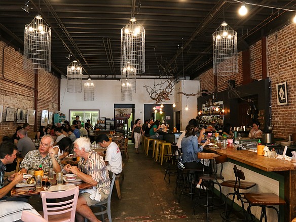 Inside of The Pig and the Lady with communal tables down the center May 7, 2015 1:55 PM : Oahu