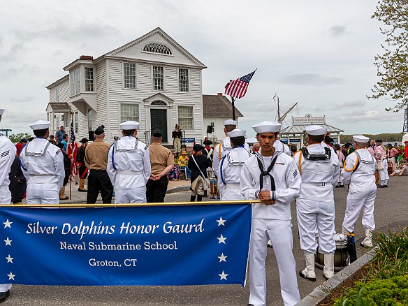 BurningOfTheShips2022-041 The ten fife and drum corps muster at the foot of Main Street, in front of the town dock and the CT River Museum where Vicki Miorelli, captain of the Sailing...