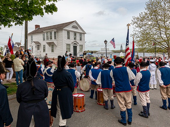 BurningOfTheShips2022-048 The ten fife and drum corps muster at the foot of Main Street, in front of the town dock and the CT River Museum where Vicki Miorelli, captain of the Sailing...