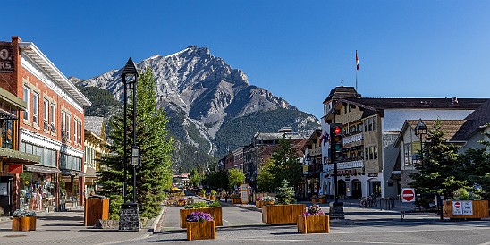 Banff-014 We had some time to kill before our gondola ride so we strolled around Banff whose main street is pedestrian-only with Cascade Mountain in the background.