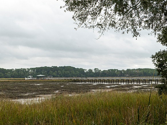 Bluffton2019-009 Boat docks are accessed by long piers over the salt marsh and mud to where there's finally open water