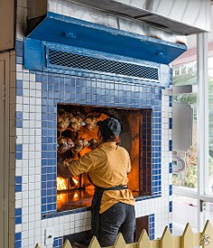 GrandCayman2015-011 The rotisserie is a huge wood-fired affair right by the front door