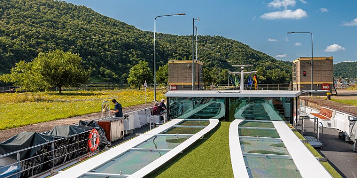 Cochem2025-003 It's hard to describe how incredibly tight and precise the boats fit in the lock. Suffice it to say that the locks are standardized at 39' wide and the boat is...
