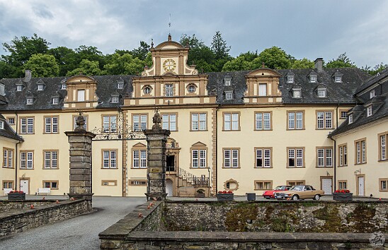 Cologne2025-002 Schloss Ehreshoven is a moated castle (note the entrance driveway crosses over the moat) that was originally founded as an abbey in 1164. It was given to the...