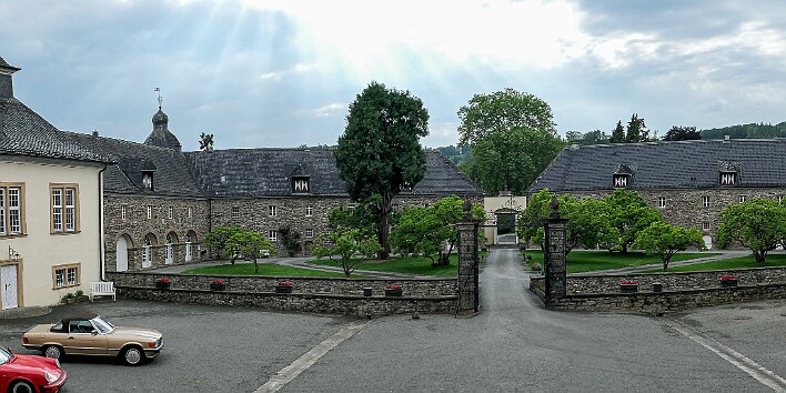 Cologne2025-003 View from the castle's main entrance, the moat is between the parallel stone walls.