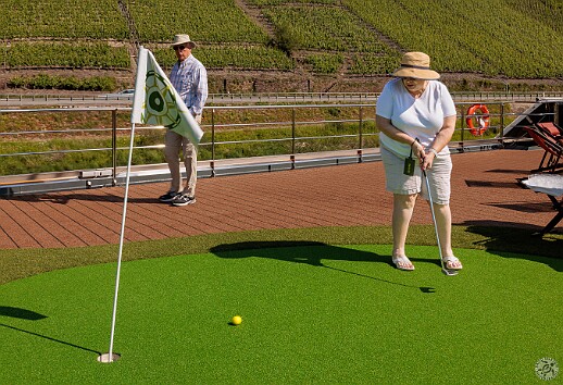 Koblenz2025-010 After a couple of Tequila Sunrises, it's a good thing my camera has autofocus as Max aims for the pin ⛳