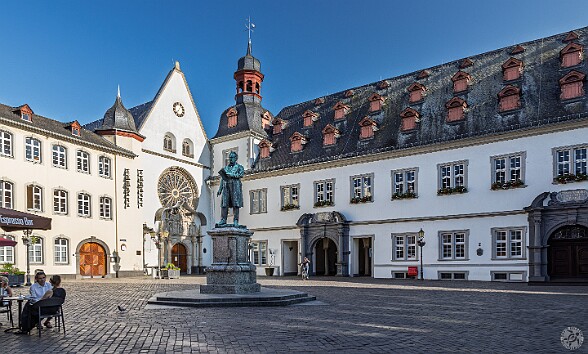 Koblenz2025-033 Working on clue #3, we made it to Jesuitenplatz with its statue honoring Johannes Müller, a famous physiologist and comparative anatomist who was born in...