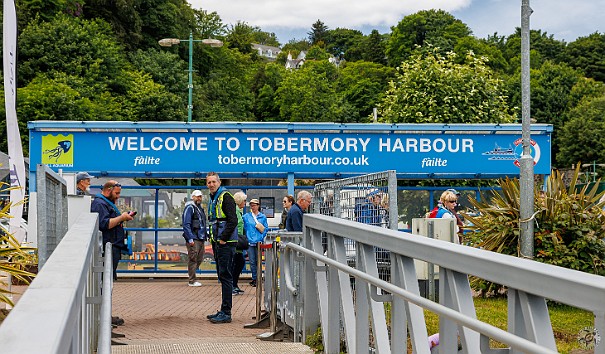 IsleOfMull2024-010 Pulling into Tobermory Harbor, even our ship was too large to dock and we had to tender into the pier