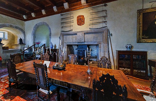 IsleOfMull2024-036 The great room with the Maclean coat of arms above the fireplace. Again you can get a feel for how thick the walls are around the window at the far left.