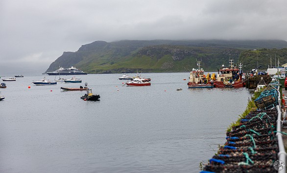 IsleOfSkye2024-003 Sunday morning in the mist and rain we pulled into Portree harbor, the largest town on the Isle of Skye, population 2300.