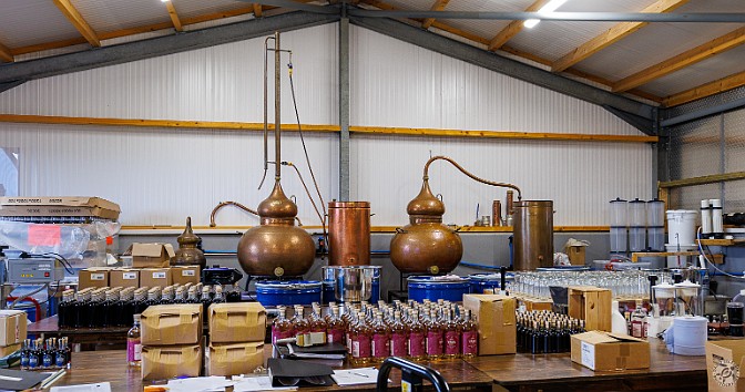 Orkney2024-023 Their three tiny Portuguese copper pot stills at the back of the bottling and packaging area. Compare the size of these stills to the huge two-story stills we...