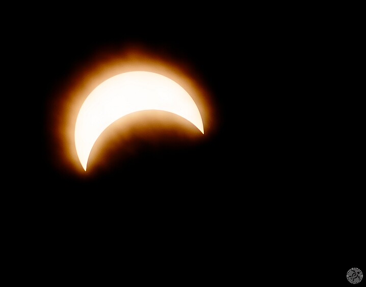 Solar Eclipse 2017-070-Enhanced-NR45-11x14 Shortly after maximum obscuration, thick cloud cover came in. The glow in the photo are the clouds, not any solar flares or corona.