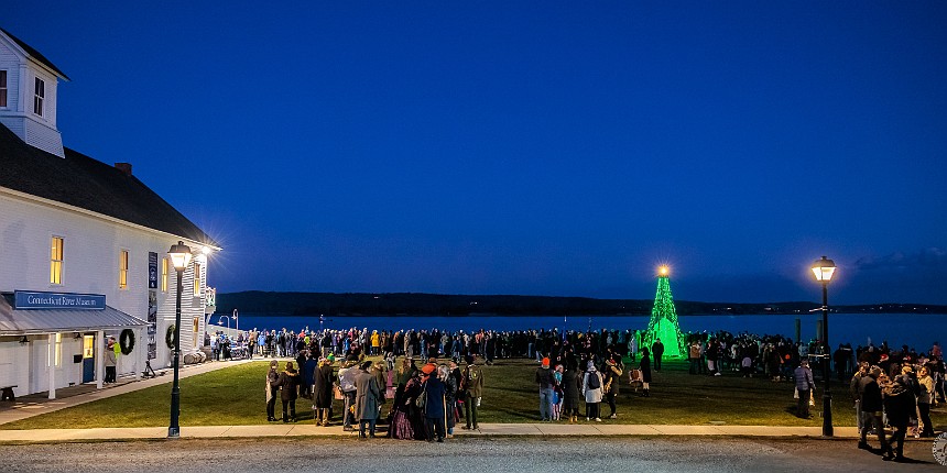 TreesInTheRigging2024-013 After the land parade is over, everyone migrates to the waterfront to watch the boats with 