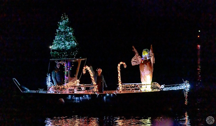 TreesInTheRigging2024-014 After the land parade is over, everyone migrates to the waterfront to watch the parade of boats with 