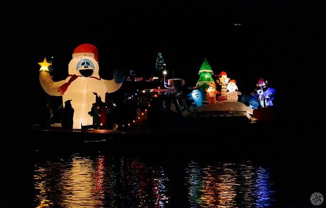 TreesInTheRigging2024-020 After the land parade is over, everyone migrates to the waterfront to watch the parade of boats with 